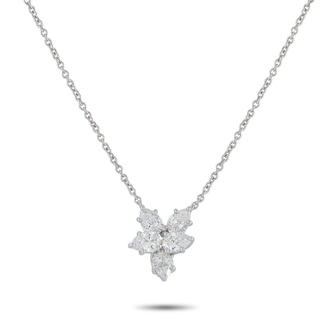HARRY WINSTON PLATINUM 1.0CT DIAMOND NECKLACE: Add timeless luxury to any ensemble with this classic Harry Winston necklace. A cluster of Diamonds with a total weight of 1.0 carats effortlessly catch the light along with your every movement. Set i