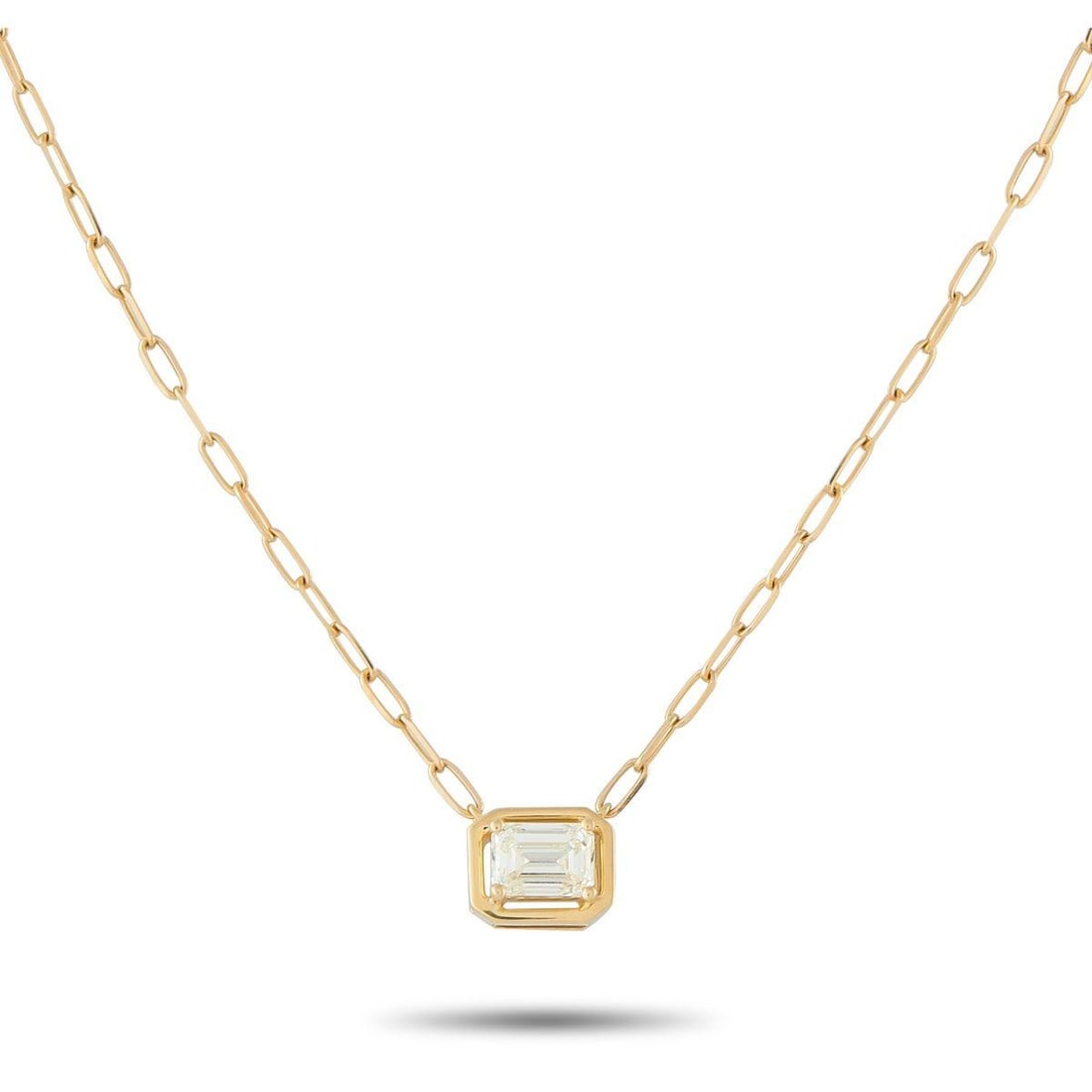 18K YELLOW GOLD 0.75CT DIAMOND NECKLACE: An 0.75 carat Diamond makes a statement on this simple, elegant necklace. Set in 18K Yellow Gold, the pendant measures 0.32 long by 0.38 wide and is suspended from a 15 paperclip chain.This jewelry pi
