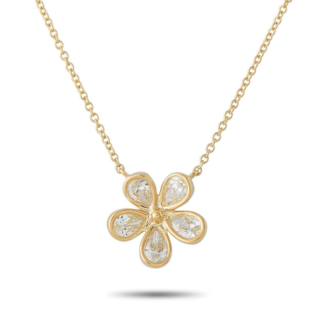 18K YELLOW GOLD 1.0CT DIAMOND FLOWER NECKLACE: This necklace offers elegance, charm, and sophistication. Diamonds with a total weight of 1.0 carats allow the flower shaped pendant to shine brightly every time it catches the light. Set in 18K Yello