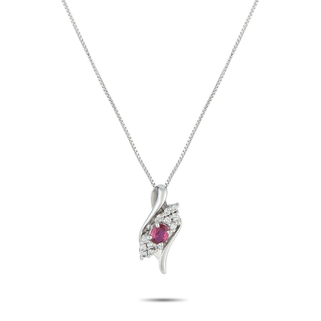 PLATINUM 0.18CT DIAMOND AND RUBY PENDANT NECKLACE: The captivating style of this piece makes it a notable addition to any collection. The box chain holds a unique pendant that captures the drama of motion. It has a swirled platinum ribbon that twists 