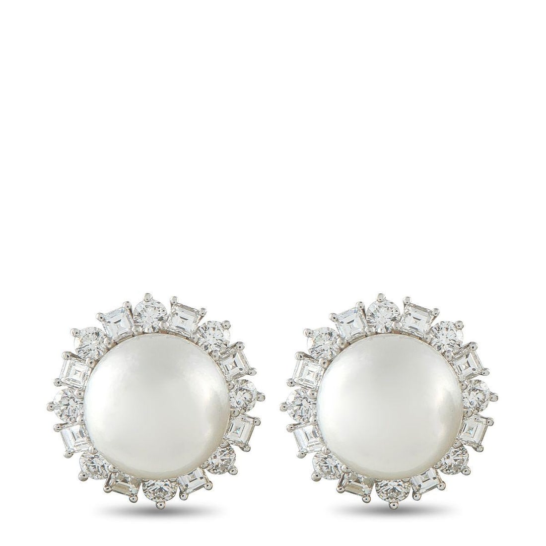 HARRY WINSTON PLATINUM 3.20CT DIAMOND AND PEARL EARRINGS: These Harry Winston earrings are incredibly sophisticated. Luminous 13.2mm Pearls make a statement at the center, while a halo of Diamonds effortlessly accents each earring. Together, they feature Dia