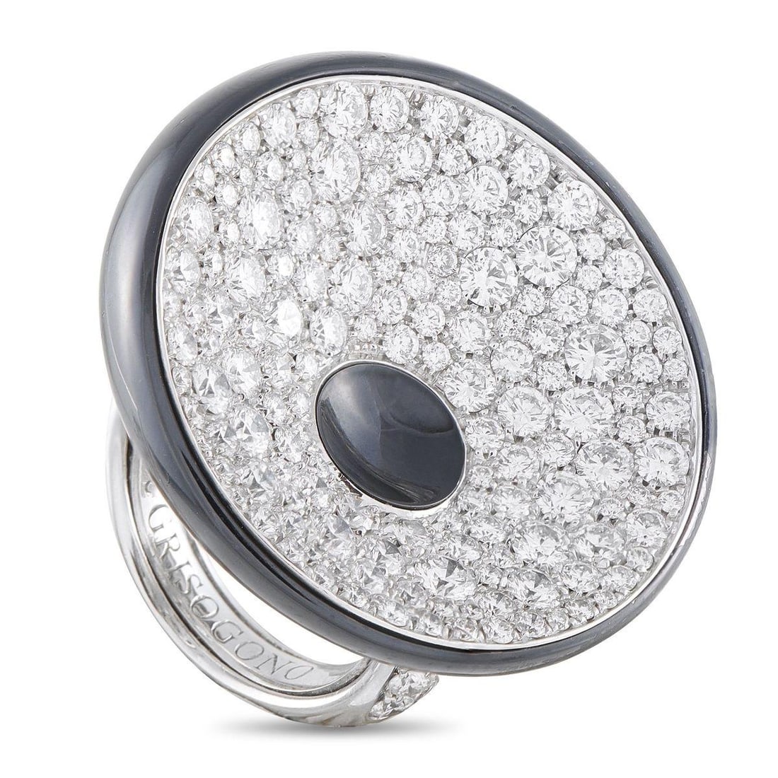 DE GRISOGONO 18K WHITE GOLD 6.76CT DIAMOND STATEMENT RING: For maximalist glamour. This de Grisogono statement ring is crafted in lustrous 18K white gold, with a diamond-traced band leading up to the remarkable centerpiece. A bold, oversized onyx disc rests a