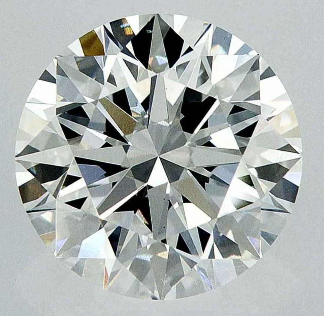 Lab Grown 3.22 ct, Color E/VS1 IGI Graded Diamond: Lab/Natural Diamond: Lab Carat Weight: 3.22 Color Grade: E Clarity Grade: VS1 Model: Round Brilliant Fluorescence: None Polish: Excellent Symmetry: Excellent Cut Grade: Ideal Size: 9.39 - 9.45 X 5.84 