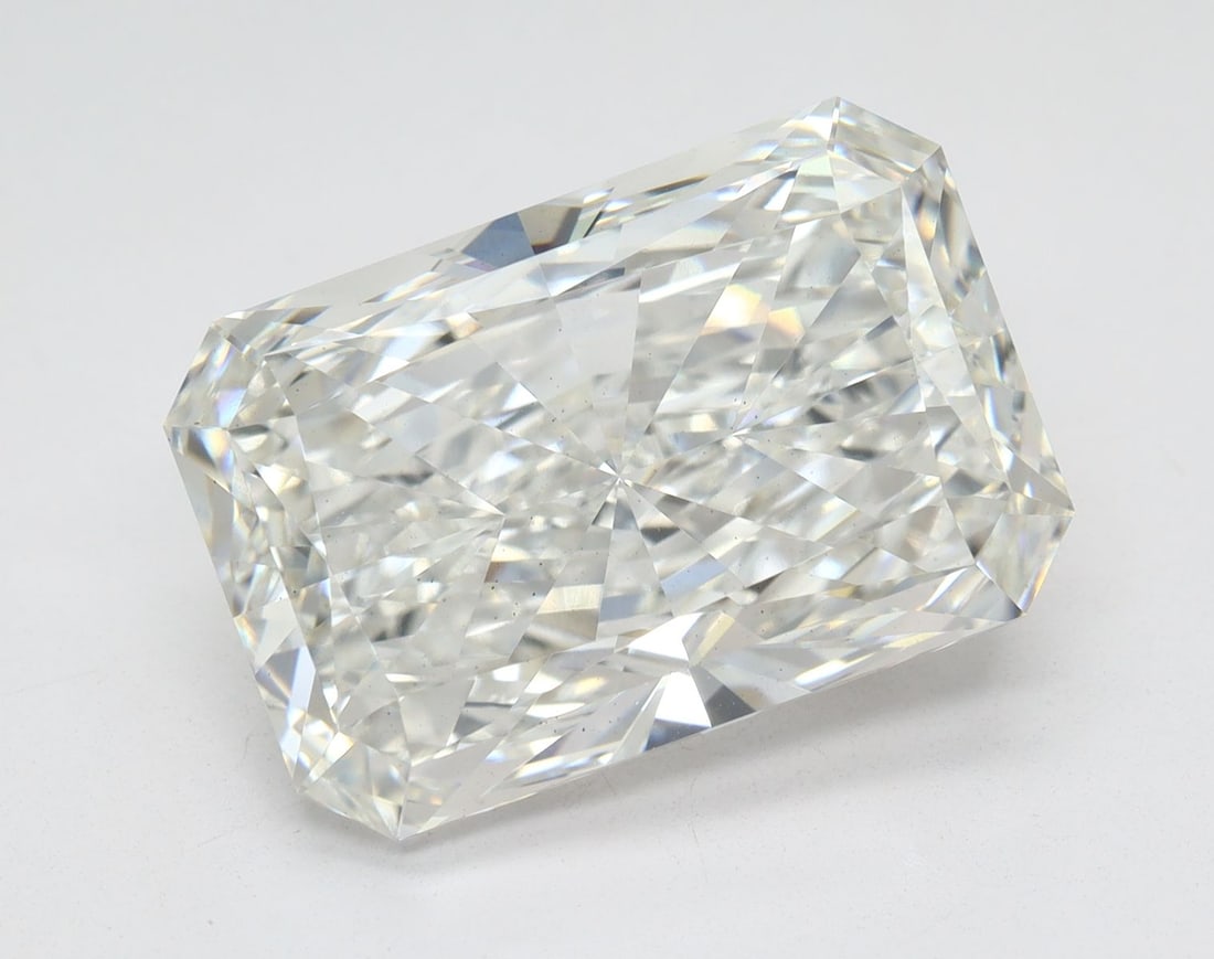 Lab Grown 3.02 ct, Color D/VS1 IGI Graded Diamond: Lab/Natural Diamond: Lab Carat Weight: 3.02 Color Grade: D Clarity Grade: VS1 Model: RADIANT Fluorescence: None Polish: EX Symmetry: EX Depth: 66.7 Table: 67 Size: 9.83-7.03*4.69 Certificate Number: 7