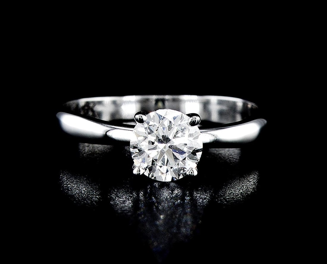 14kt White Gold 1.01ctw Diamond Ring: One 14k white gold ring (14k stamped), set with lab grown diamond. Jewelry Weight: 2.36Grs Total Diamonds Weight: 1.01Cts Main Stones Description: Quantity: 1 Cut and shape: Round Brilliant Carats Wei