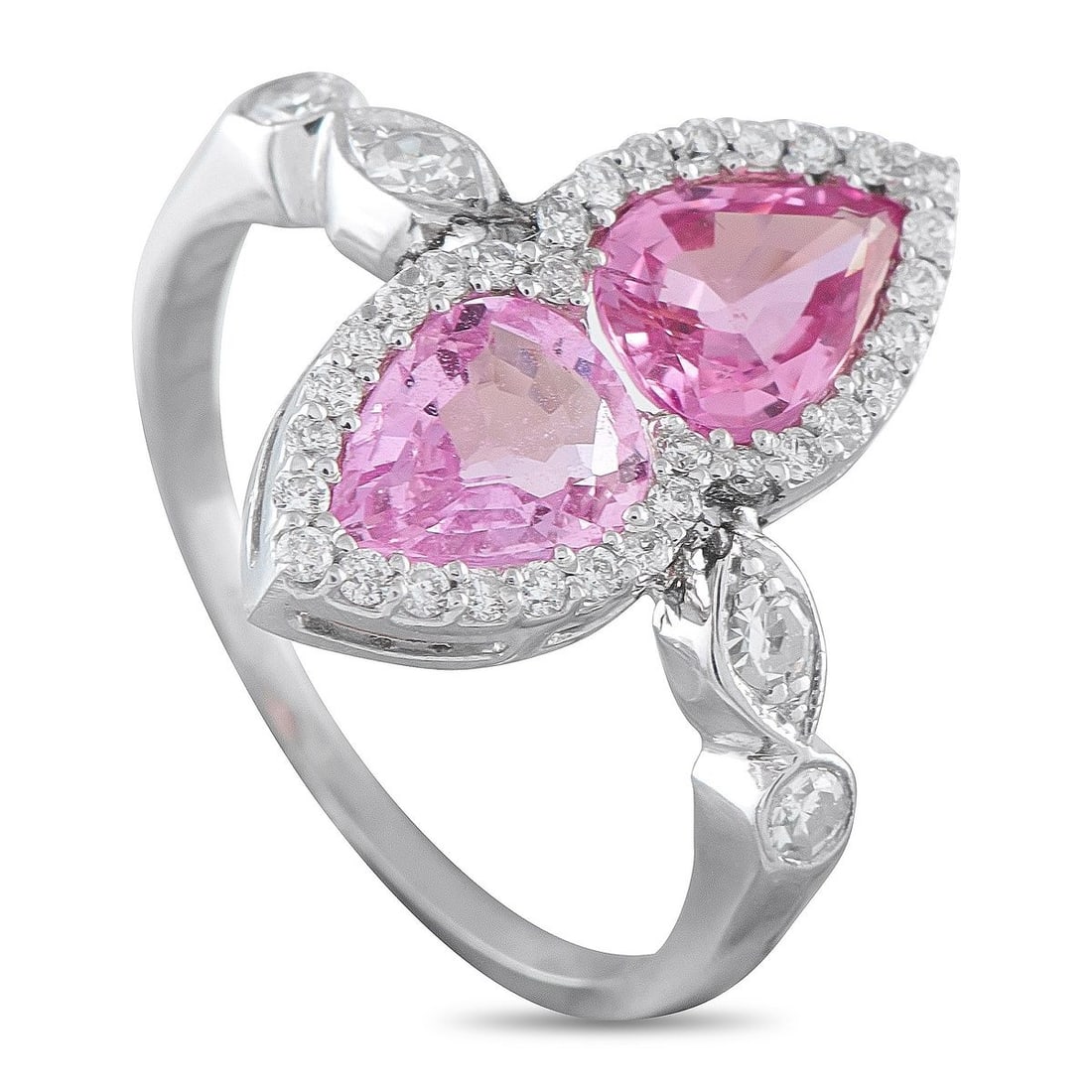 PLATINUM 0.27CT DIAMOND AND SAPPHIRE RING: This dazzling ring offers a stunning sense of symmetry. At the center, a pair of pink Sapphires totaling 2.0 carats add a stylish pop of color to the intricate Platinum setting. Diamonds with a total 