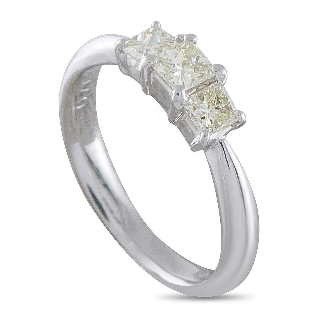 PLATINUM 0.71CT DIAMOND THREE-STONE RING: This luxury ring will add a touch of sparkle to absolutely any ensemble. Set in Platinum, it features a trio of sparkling Diamonds with a total weight of 0.71 carats. A 2mm wide band and a 4mm top hei