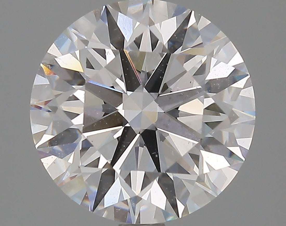 Lab Grown 3.4 ct, Color D/VS1 IGI Graded Diamond: Lab/Natural Diamond: Lab Carat Weight: 3.4 Color Grade: D Clarity Grade: VS1 Model: Round Brilliant Polish: Excellent Symmetry: Excellent Cut Grade: Ideal Size: 9.56 - 9.58 X 5.97 Certificate Number: 