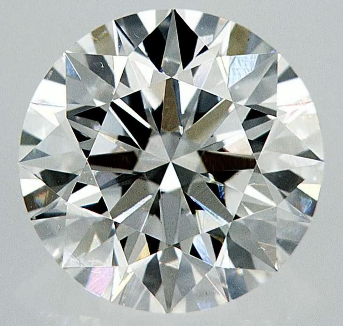 Lab Grown 1.81 ct, Color F/VS1 IGI Graded Diamond: Lab/Natural Diamond: Lab Carat Weight: 1.81 Color Grade: F Clarity Grade: VS1 Model: Round Brilliant Fluorescence: None Polish: Excellent Symmetry: Excellent Cut Grade: Ideal Size: 7.82 - 7.88 x 4.81 