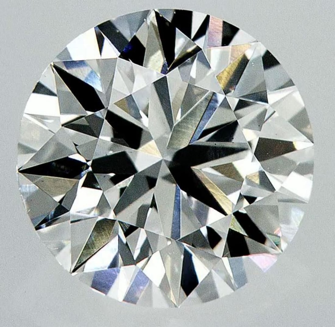 Lab Grown 1.97 ct, Color E/VS1 IGI Graded Diamond: Lab/Natural Diamond: Lab Carat Weight: 1.97 Color Grade: E Clarity Grade: VS1 Model: Round Brilliant Fluorescence: None Polish: Excellent Symmetry: Excellent Cut Grade: Ideal Size: 8.09 - 8.12 X 4.90 