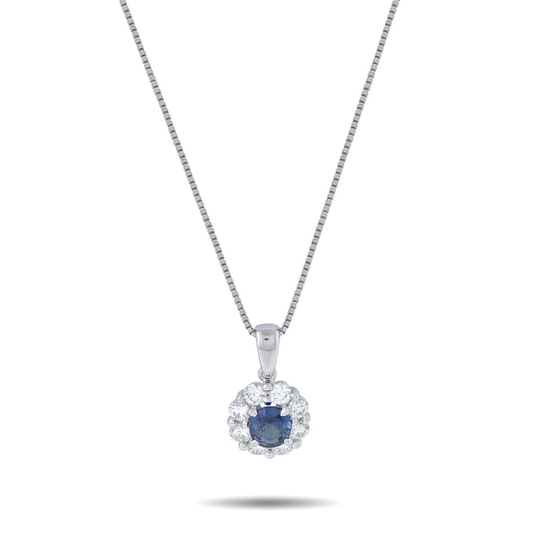 PLATINUM 0.66CT DIAMOND AND COLOR CHANGE GARNET PENDANT NECKLACE: This luxury necklace offers understated elegance. Set in Platinum, it features a rare 0.83 carat color change garnet center stone surrounded by diamonds totaling 0.66 carats. The pendant measures 0.75