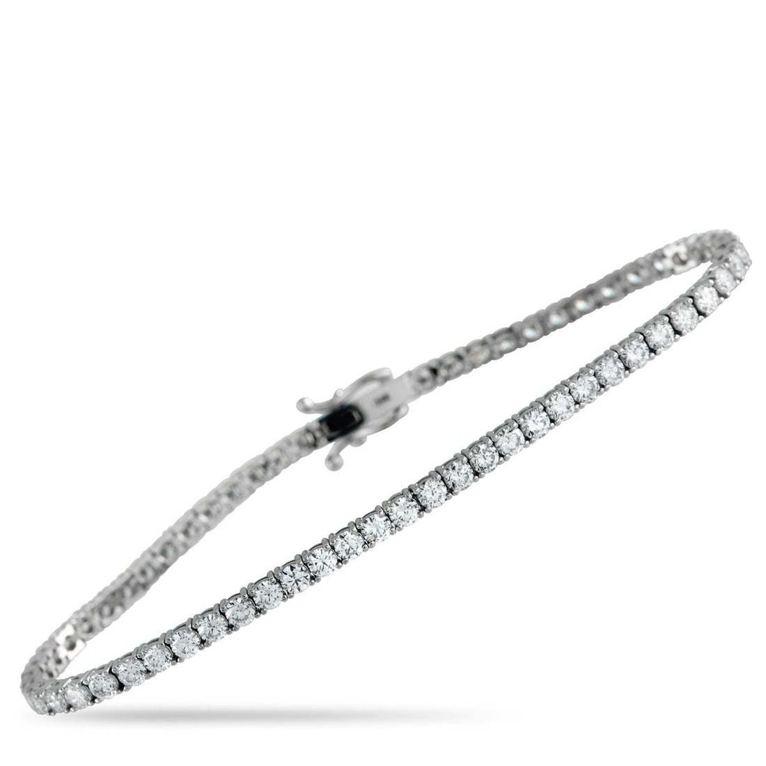 14K WHITE GOLD 5.05CT LAB-GROWN DIAMOND TENNIS BRACELET: Add a touch of luxury to any ensemble with this tennis bracelet. The understated 14K White Gold setting allows Lab Grown Diamonds totaling 5.05 carats to take center stage. This elegant accessory meas