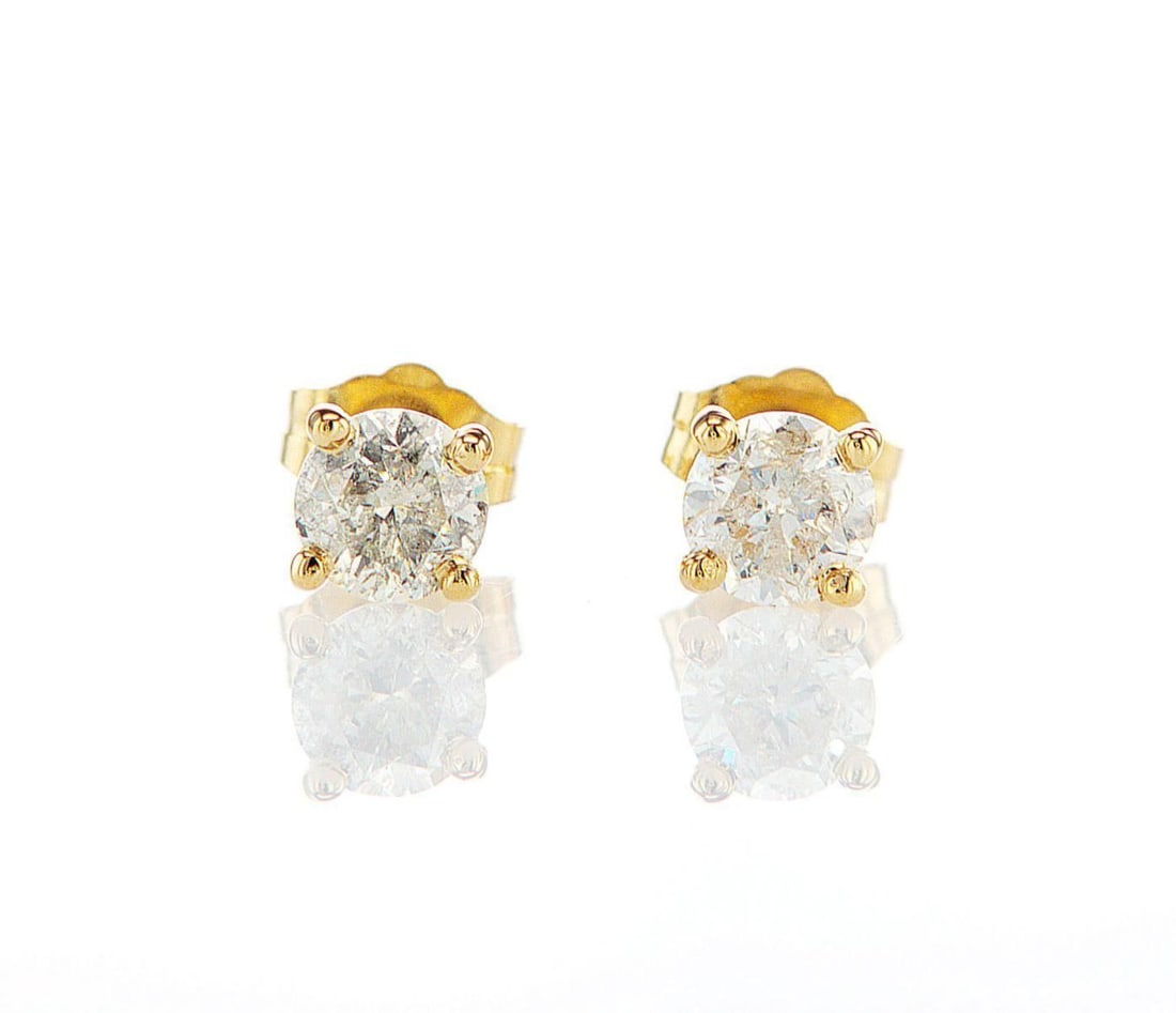 14kt Yellow Gold 1.01ctw Diamond Earrings: Jewelry Description Description: One pair of 14k yellow gold earrings, set with natural diamonds. Jewelry Weight: 0.84 Grs Total Diamonds Weight: 1.01 Cts Precious Metal: 14kt Yellow Gold Certificate 