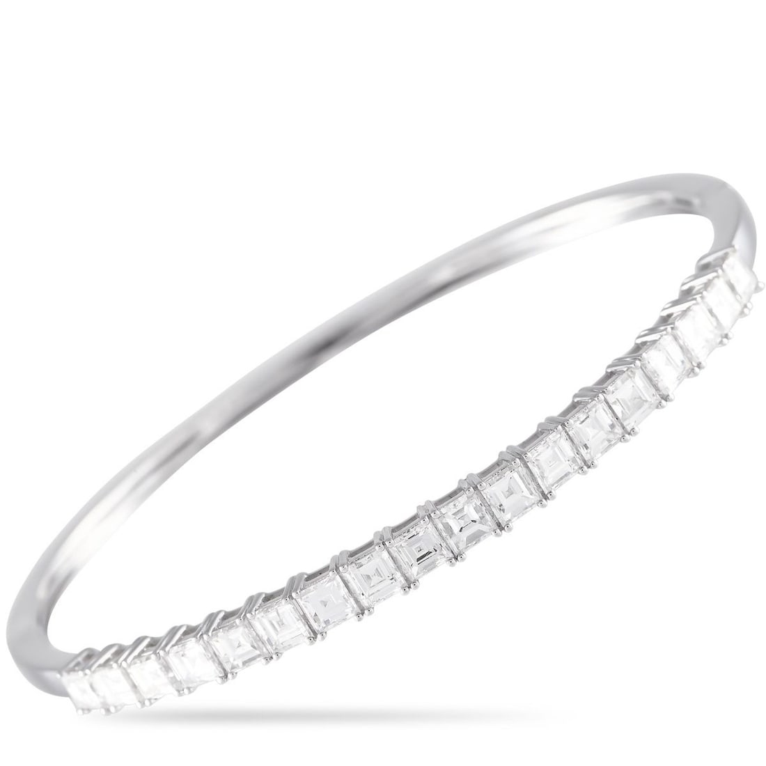 18K WHITE GOLD 4.0CT DIAMOND BRACELET: Square-cut diamonds with a total weight of 4.0 carats serve as a stunning focal point on this impressive bangle bracelet. Ideal for any occasion, the minimalist setting is crafted from 18K white gold 