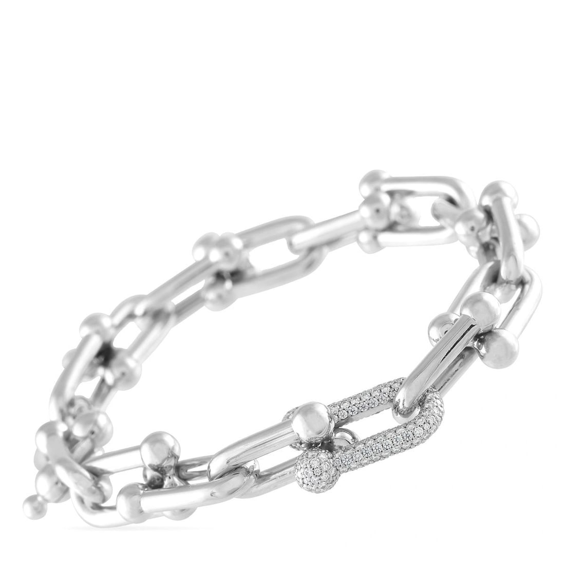 TIFFANY & CO. HARDWEAR 18K WHITE GOLD 1.70CT DIAMOND LINK BRACELET: This link bracelet from the Tiffany & Co. HardWear collection offers enduring strength. On this piece, the collections signature gauge links are crafted from 18K rose gold and combine to create this s