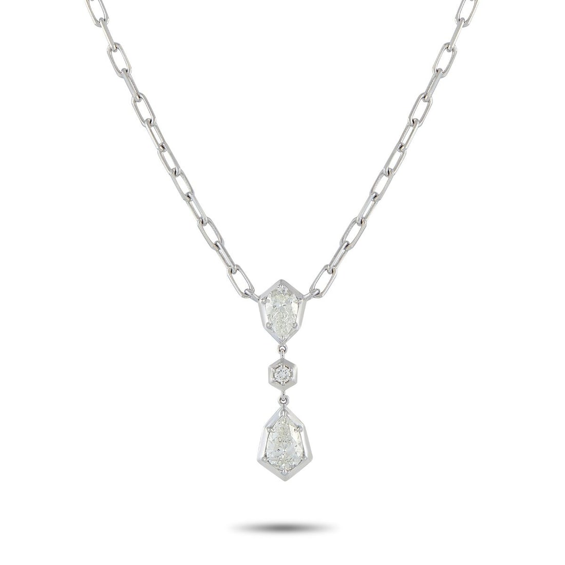 18K WHITE GOLD 1.32 CT DIAMOND NECKLACE: Geometry leads the design, with every stone in this necklace positioned to reinforce its bold look. A pear-shaped diamond, set on four prongs, rests on an angular white gold frame with its pointed end