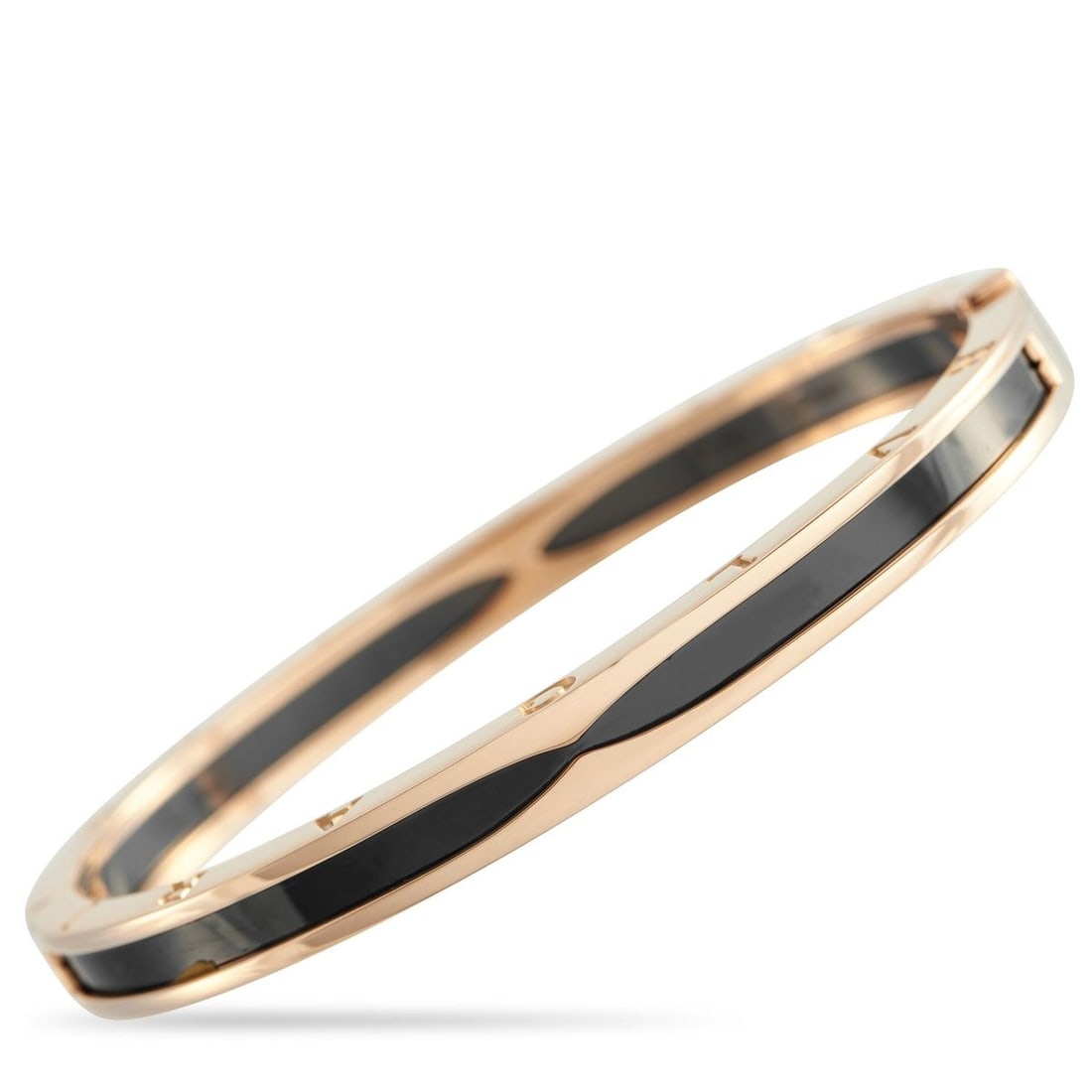 BVLGARI B.ZERO1 18K ROSE GOLD CERAMIC BRACELET: This Bvlgari B.Zero1 bracelet is an innovative piece that pairs intricate craftsmanship with industrial design. Sleek and sophisticated, the center of this bangle bracelet features a bold black cerami
