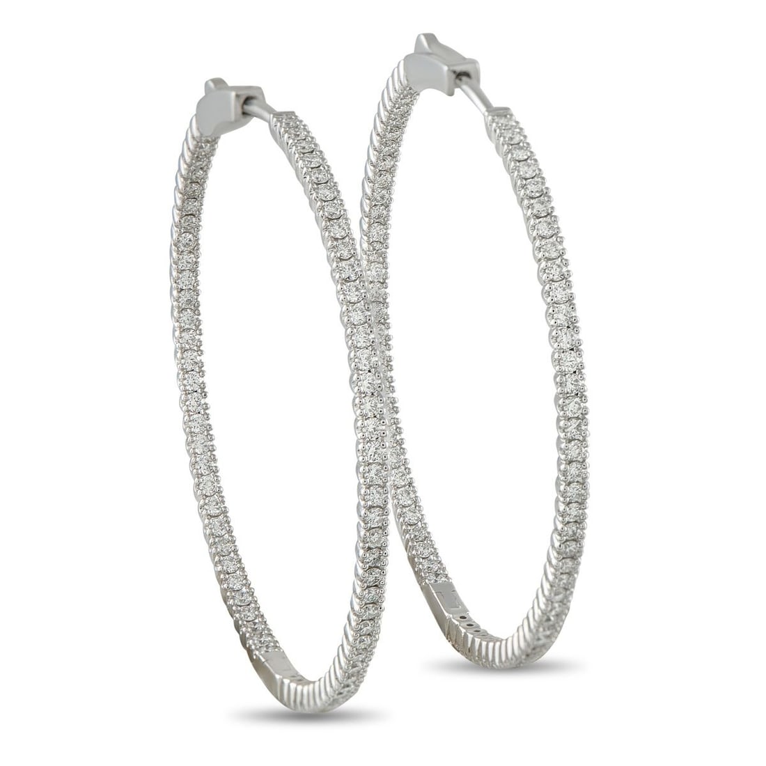 14K WHITE GOLD 1.56CT DIAMOND INSIDE-OUT HOOP EARRINGS: Add a touch of sophistication to any outfit with these elegant hoop earrings. Crafted from 14K White Gold, the classic design is elevated by sparkling Diamonds totaling 1.56 carats. Each earring measu