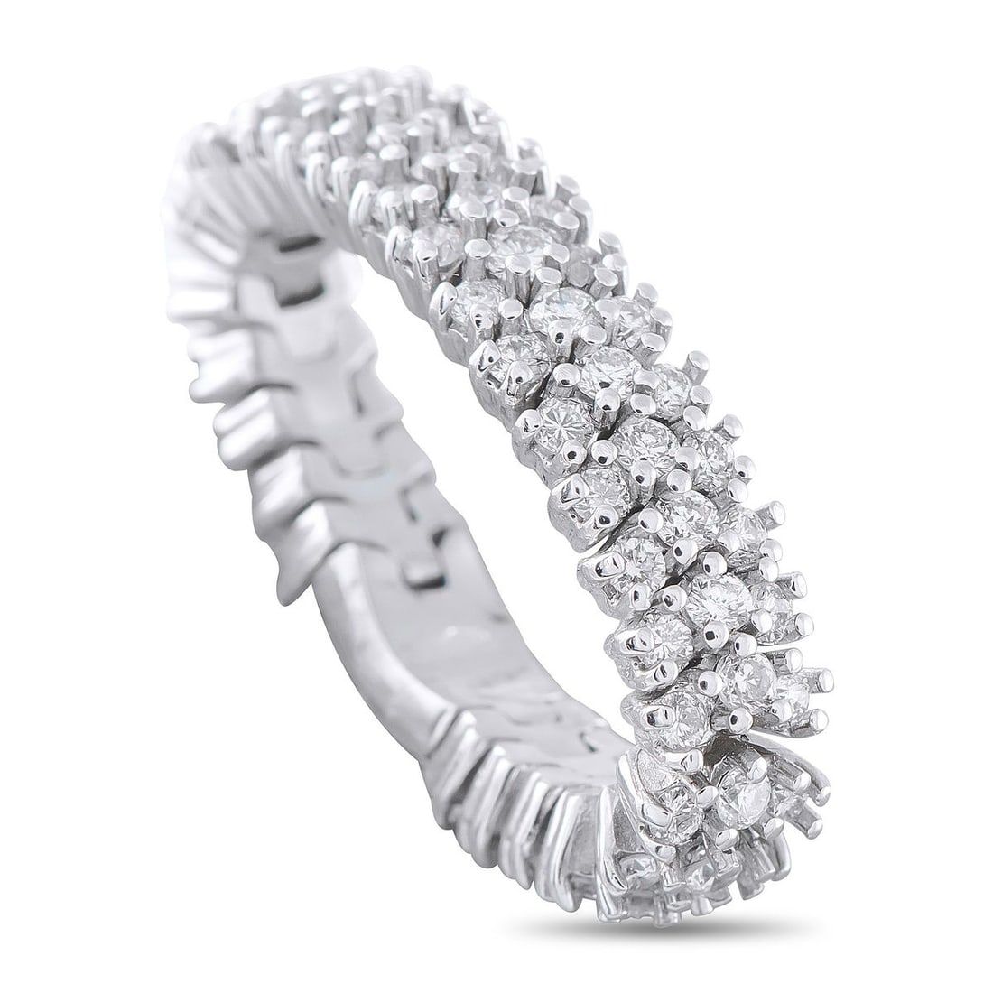 18K WHITE GOLD 2.29CT DIAMOND RING: This radiant ring is unlike anything youve seen before. A unique 18K White Gold setting adds texture and dimension to the understated design. Sparkling Diamonds with a total weight of 2.29 carats effo