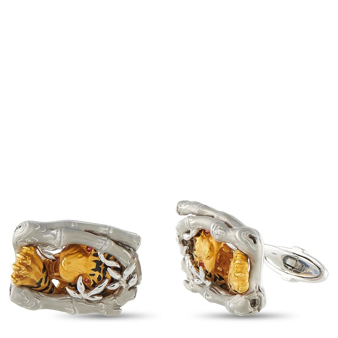 MAGERIT 18K YELLOW AND WHITE GOLD TIGER CUFFLINKS: An 18K Yellow Gold tiger emerges from the center of these stylish Magerit cufflinks. Crafted from 18K White Gold, each one measures 0.63 long by 0.82 wide. Together, they weigh 23.7 grams.This jewelry