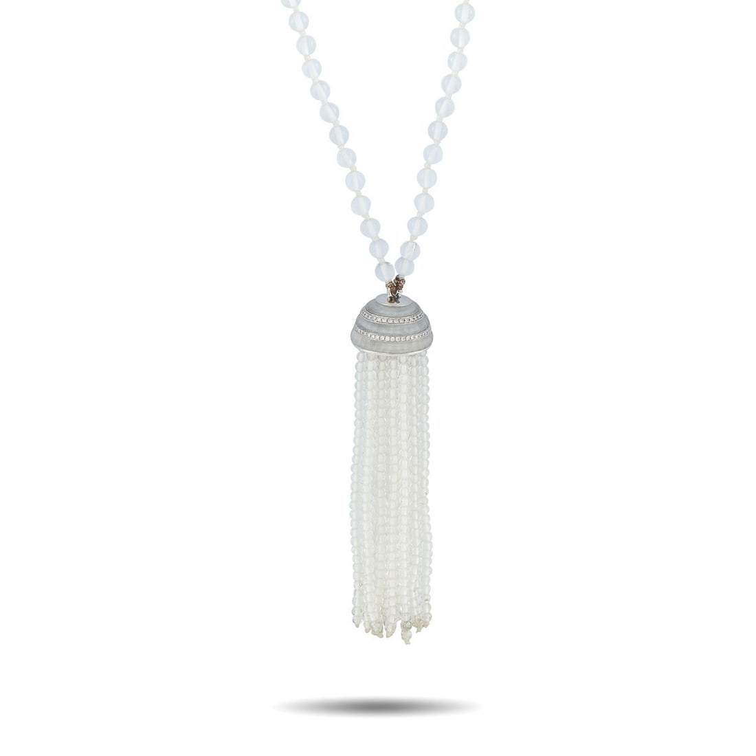IVANKA TRUMP 18K WHITE GOLD DIAMOND AND CRYSTAL TASSEL NECKLACE: This Ivanka Trump necklace is a chic luxury piece that will continually make a statement. At the center of this pieces dramatic 38 chain, a tassel motif adds texture and movement to the overall design
