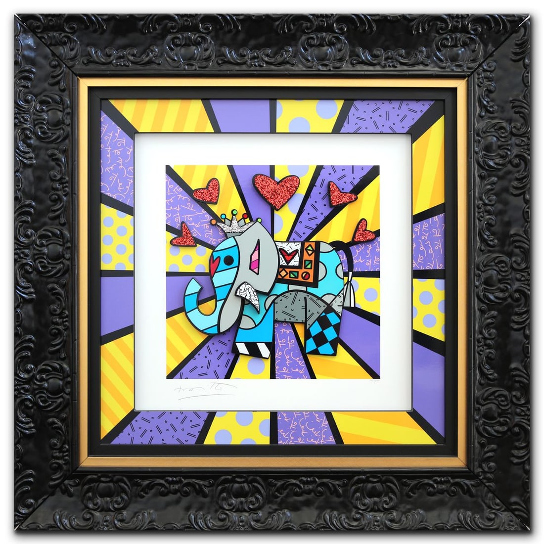 Romero Britto- Sculptograph "Blue Elephant": Artist: Romero Britto. Medium: Sculptograph. Title: Blue Elephant. Size: 19.5" x 19.5". Measures approx. 28" x 28" (framed). Signature: Hand signed and numbered. Certificate of Authenticity: Is