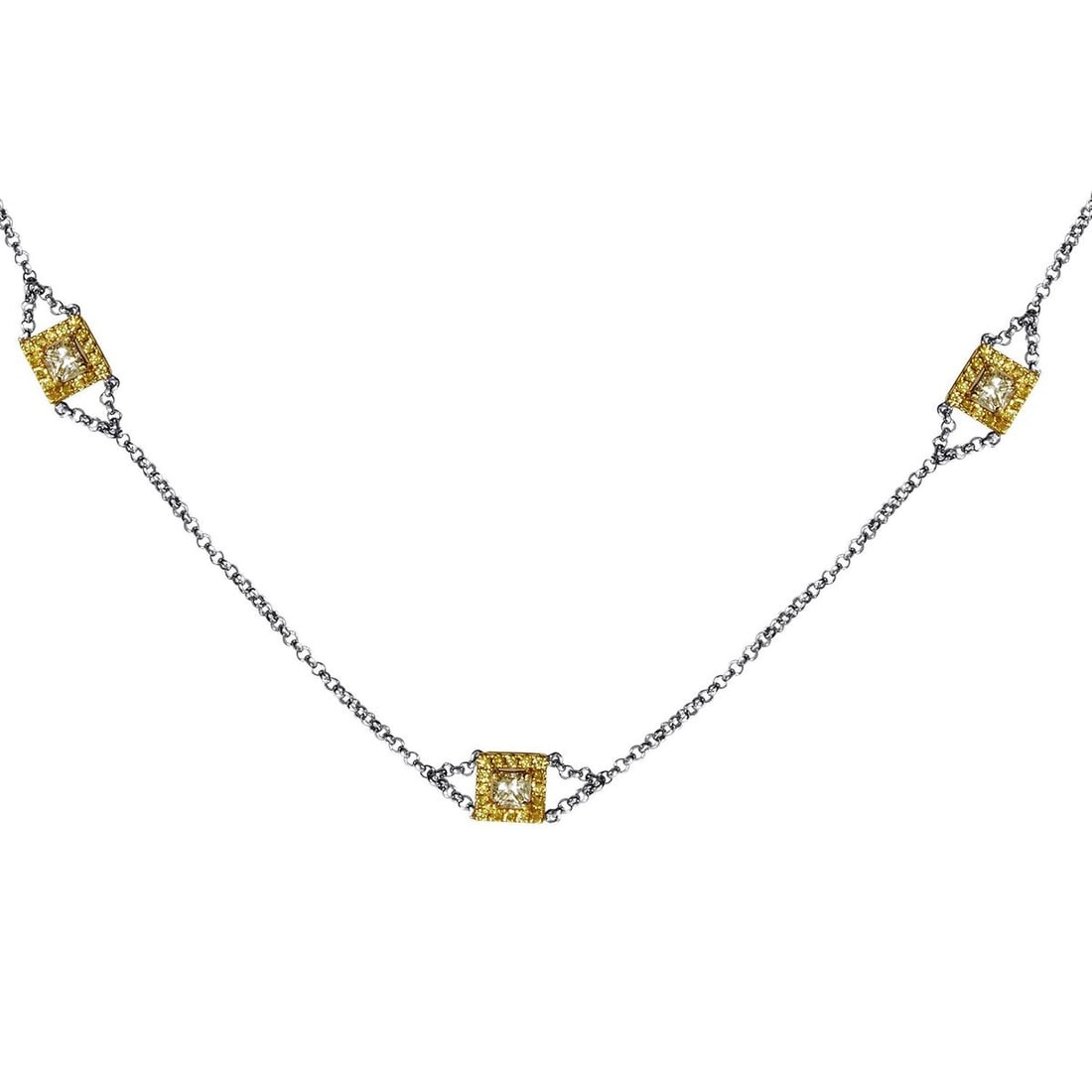 18K MULTI-TONE GOLD & DIAMOND NECKLACE: A touch of luxury to the power of three. Links of 18K White Gold are the connecting thread between three Yelllow Gold pendants. Each petite setting frames a bursting 1.40ct diamond setting. Category: 