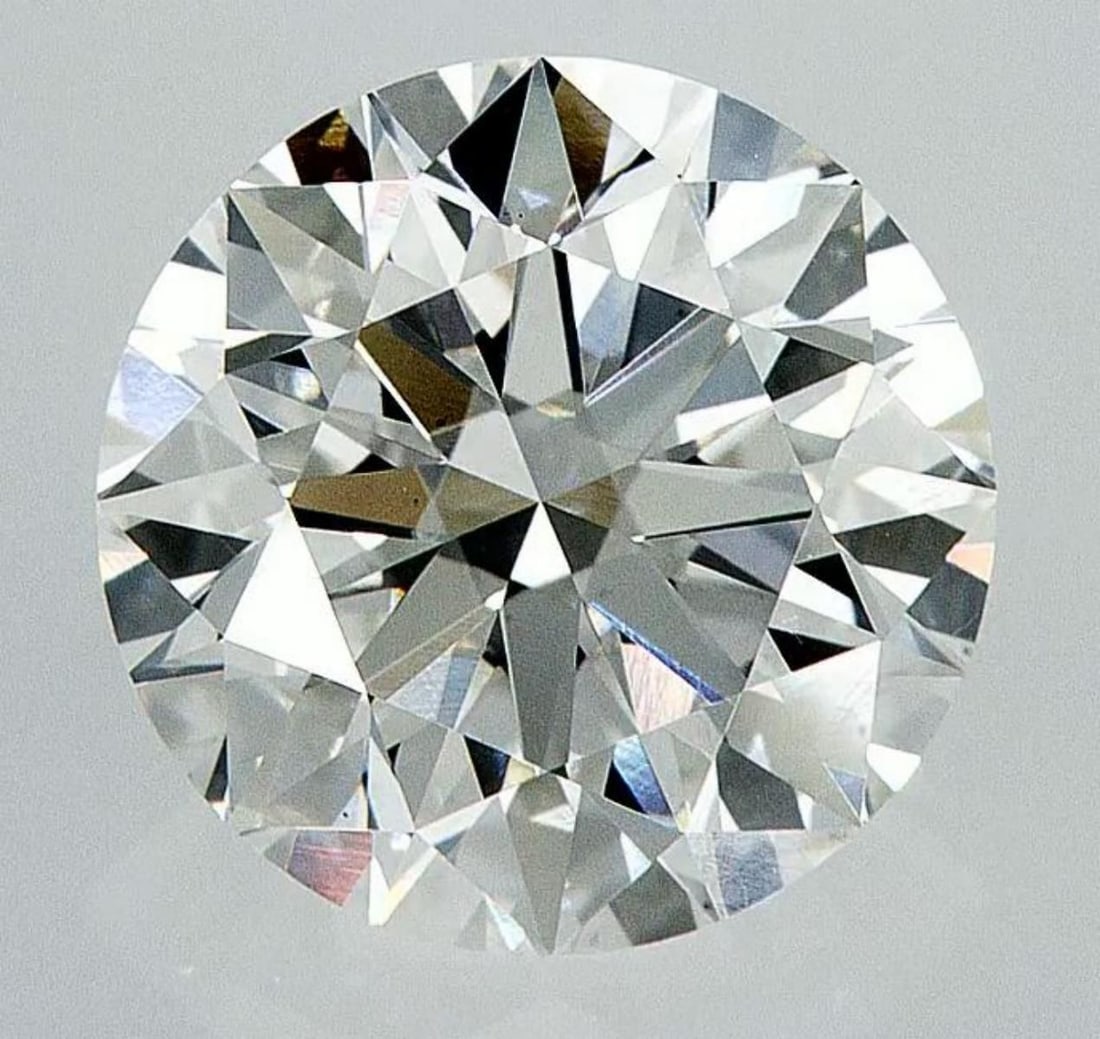 Lab Grown 3.52 ct, Color F/VS1 IGI Graded Diamond: Lab/Natural Diamond: Lab Carat Weight: 3.52 Color Grade: F Clarity Grade: VS1 Model: Round Brilliant Fluorescence: None Polish: Excellent Symmetry: Excellent Cut Grade: Ideal Size: 9.67 - 9.69 X 6.01 