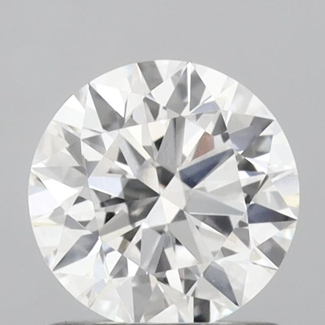Lab Grown 1.2 ct, Color D/VS1 IGI Graded Diamond: Lab/Natural Diamond: Lab Carat Weight: 1.2 Color Grade: D Clarity Grade: VS1 Model: ROUND Fluorescence: None Polish: EX Symmetry: EX Depth: 58 Table: 59 Size: 6.94*6.98*4.10 Certificate Number: 700563