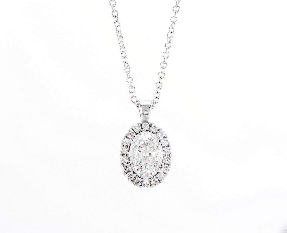 14kt White Gold 1.19ctw Diamond Pendant: Jewelry Description Description: One 14k white gold pendant, set with natural diamonds. Jewelry Weight: 2.93 Grs Total Diamonds Weight: 1.19 Cts Precious Metal: 14kt White Gold Certificate Number: DSL