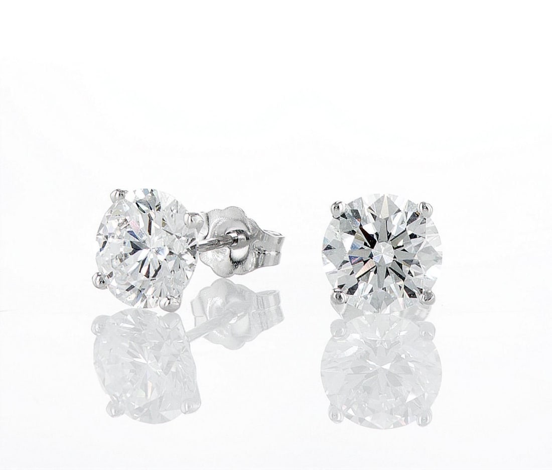 14kt White Gold 3.1ctw Diamond Earrings: Jewelry Description Description: One pair of 14k white gold earrings, set with lab grown diamonds. Jewelry Weight: 1.28 Grs Total Diamonds Weight: 3.1 Cts Precious Metal: 14kt White Gold Certificate N