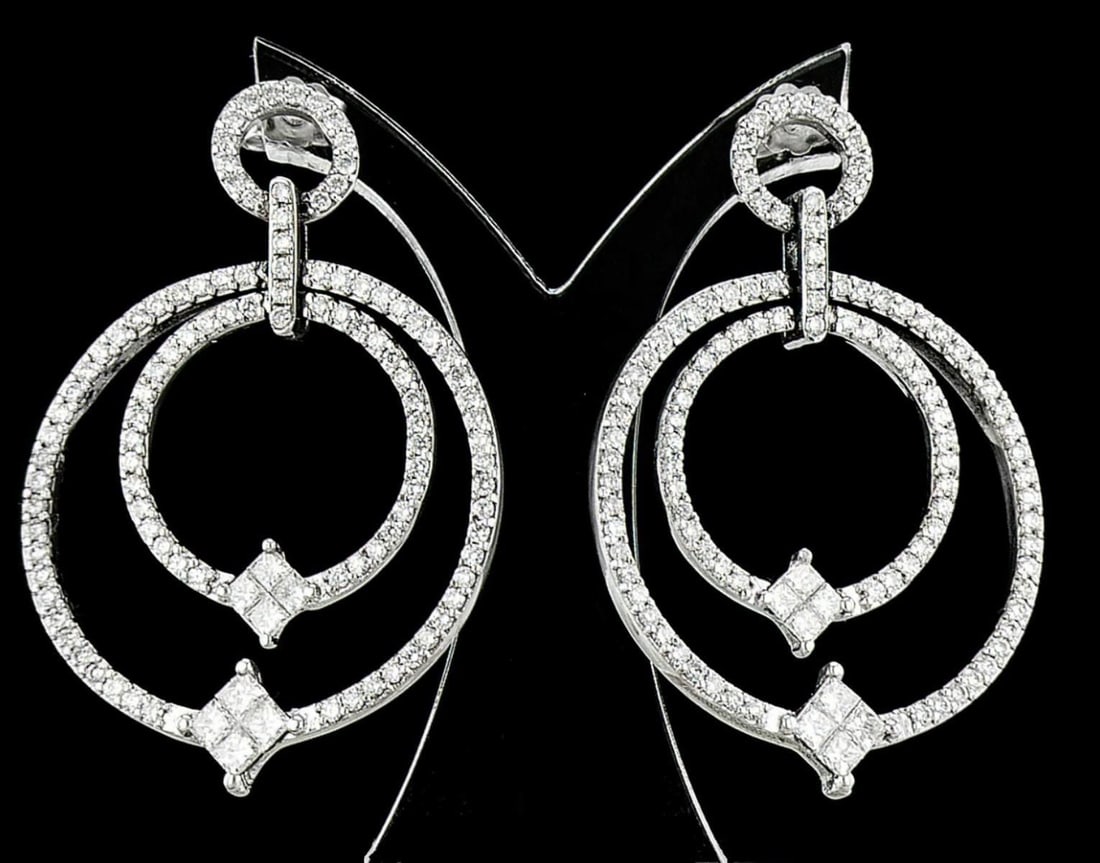 18kt White Gold 3.22ctw Diamond Earrings: One pair of 18k white gold earrings (18k stamped), each set with natural diamonds. Jewelry Weight: 14.43Grs Total Diamonds Weight: 3.22Cts Main Stones Description: Cut and shape: Round Brilliant Carat