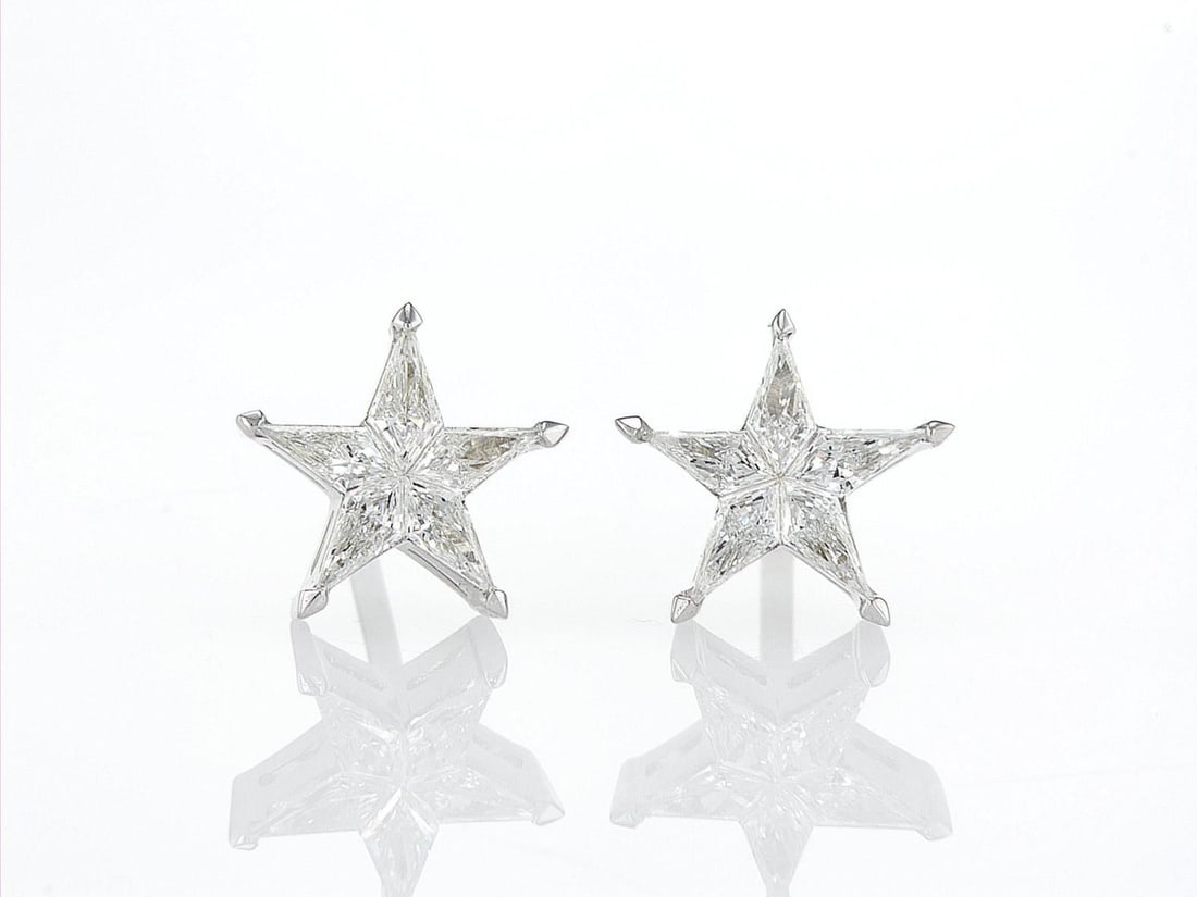 18kt White Gold 0.92ctw Diamond Earrings: One pair of 18k white gold earrings (18k stamped), each set with five natural diamonds. Jewelry Weight: 2.32Grs Total Diamonds Weight: 0.92Cts Main Stones Description: Quantity: 10 Cut and shape: Nobl