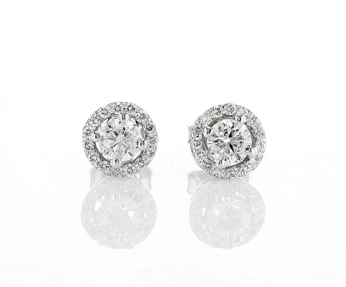 14kt White Gold 1.36ctw Diamond Earrings: Jewelry Description Description: One pair of 14k white gold earrings, set with natural diamonds. Jewelry Weight: 2.68 Grs Total Diamonds Weight: 1.36 Cts Precious Metal: 14kt White Gold Certificate Nu