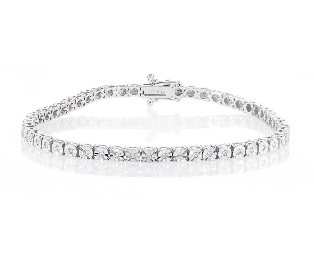 14kt White Gold 0.68ctw Diamond Bracelet: One 14k white gold bracelet, set with natural diamonds. Jewelry Weight: 10.4Grs Total Diamonds Weight: 0.68Cts Main Stones Description: Quantity: 54 Cut and shape: Round Brilliant Carats Weight: 0.68 