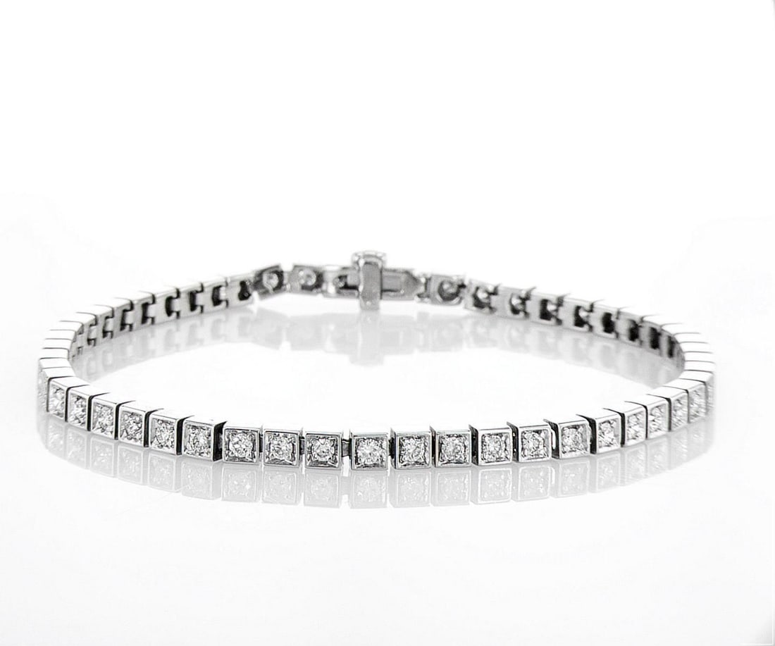 14kt White Gold 1.06ctw Diamond Bracelet: Jewelry Description Description: One 14k white gold bracelet, set with natural diamonds. Jewelry Weight: 8.45 Grs Total Diamonds Weight: 1.06 Cts Precious Metal: 14kt White Gold Certificate Number: DS