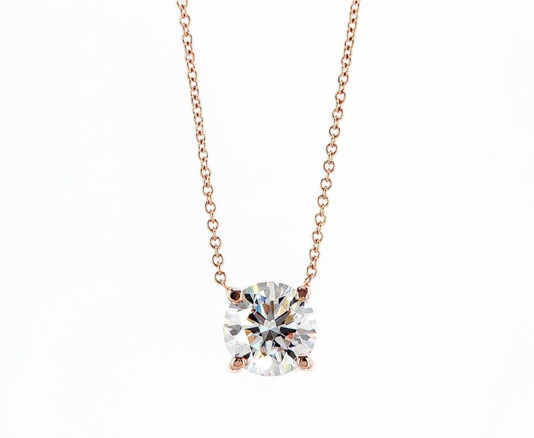 14kt Rose Gold 2.01ctw Diamond Pendant: One 14k rose gold pendant with chain, set with one center lab grown diamond. Jewelry Weight: 2.46Grs Total Diamonds Weight: 2.01Cts Main Stones Description: Quantity: 1 Cut and shape: Round Brilliant 