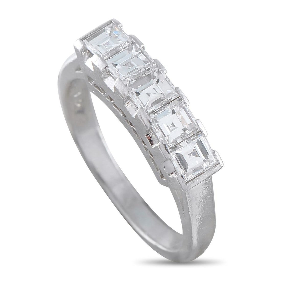 PLATINUM 1.32CT DIAMOND RING: A series of square-cut Diamonds totaling 1.32 carats make this ring simply unforgettable. Set in Platinum, this simple, elegant design features a 2mm wide band and a 6mm top height.This jewelry piece 
