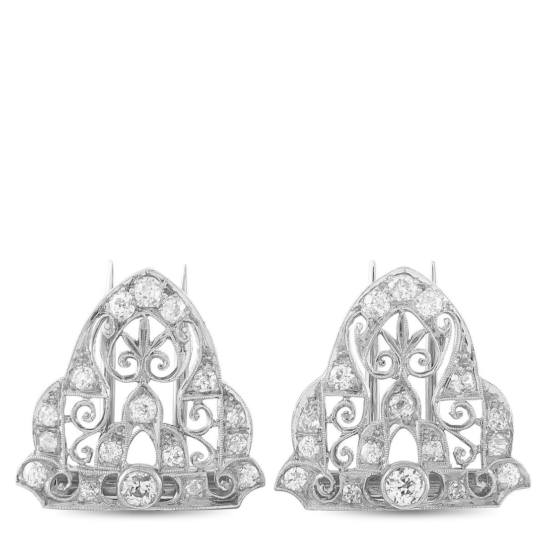 PLATINUM 1.80CT DIAMOND ART DECO DRESS CLIPS SET: A matched pair of Art Deco dress clips in platinum, each set throughout with diamonds totaling approximately 1.80 carats. The triangular forms feature open filigree scrollwork framed by delicate milgr