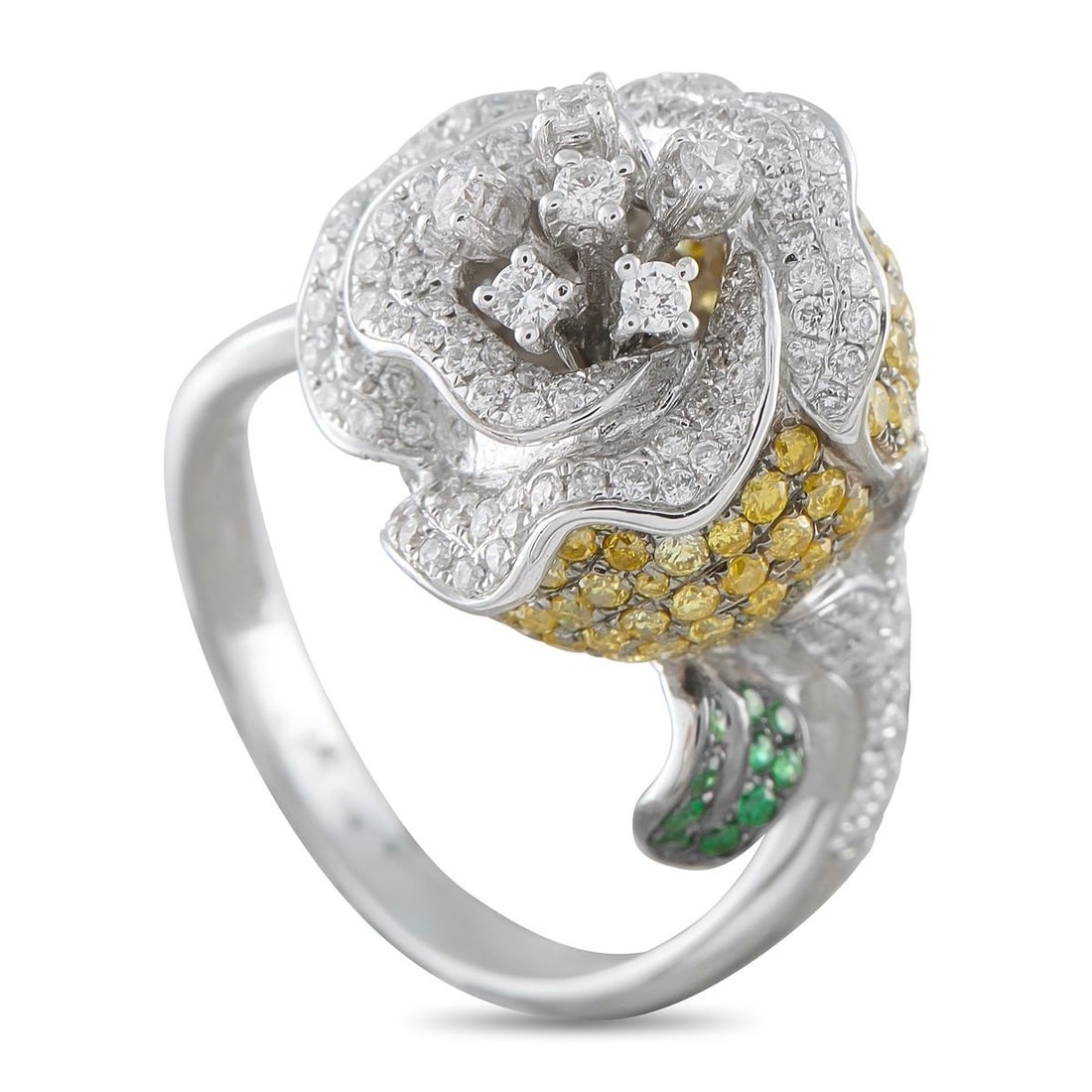 18K WHITE GOLD 1.20CT DIAMOND FLOWER RING: An intricate floral design makes this luxury ring a work of art. Incredibly detailed, the flower-shaped design comes to life thanks to white and yellow Diamonds with a total weight of 1.20 carats. Set