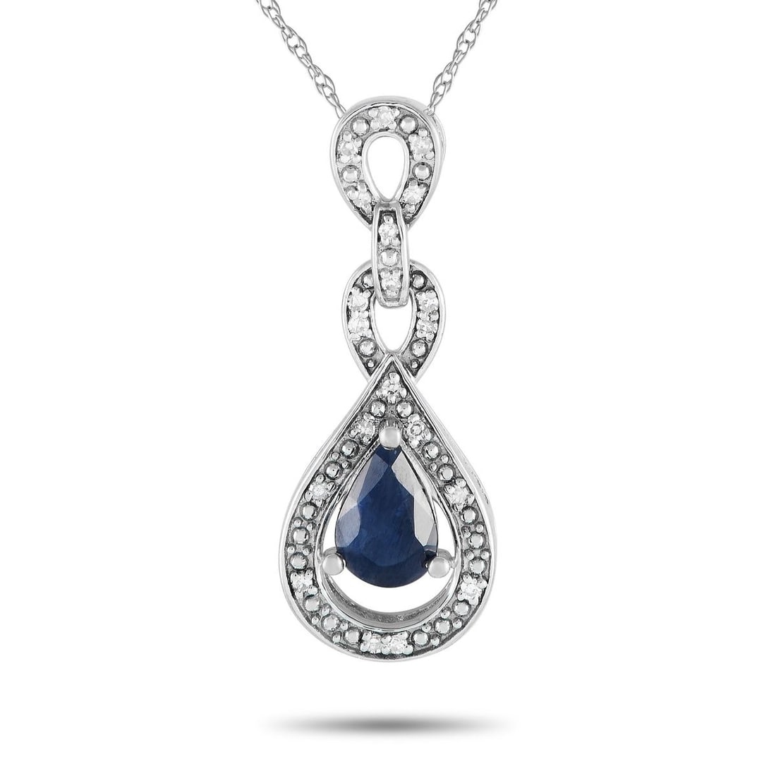 14K WHITE GOLD 0.08CT DIAMOND AND SAPPHIRE PENDANT NECKLACE: A stunning combination of gemstones makes this luxury necklace incredibly captivating. On the intricate 14K white gold pendant, youll find a stunning oval-cut sapphire gemstone paired with inset diamo