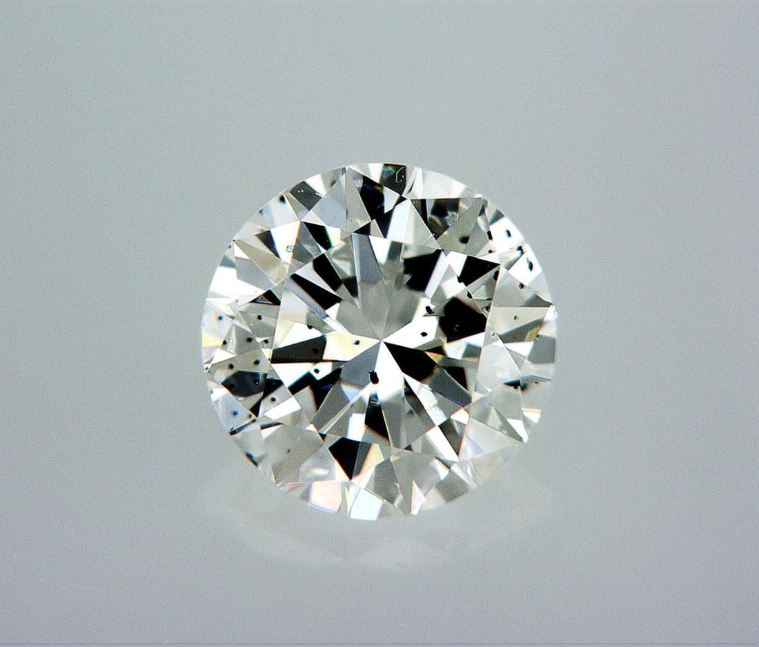 Natural 0.5 ct, Color G/SI2 GIA Graded Diamond: Lab/Natural Diamond: Natural Carat Weight: 0.5 Color Grade: G Clarity Grade: SI2 Model: Round Brilliant Fluorescence: Faint Polish: Excellent Symmetry: Very Good Cut Grade: Good Size: 5.04 - 5.07 X 3.