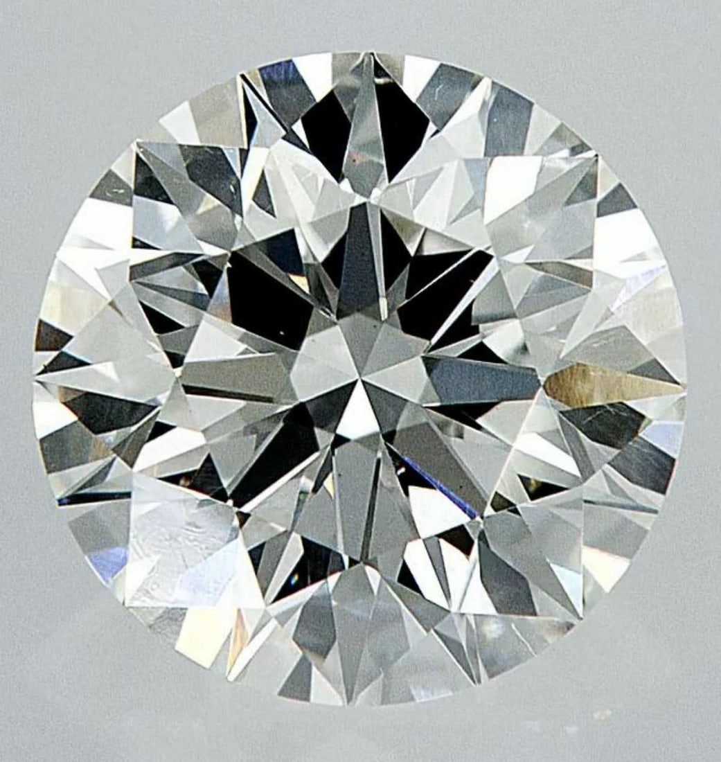 Lab Grown 2.07 ct, Color F/VS1 IGI Graded Diamond: Lab/Natural Diamond: Lab Carat Weight: 2.07 Color Grade: F Clarity Grade: VS1 Model: Round Brilliant Fluorescence: None Polish: Excellent Symmetry: Excellent Cut Grade: Ideal Size: 8.14 - 8.18 X 5.09 