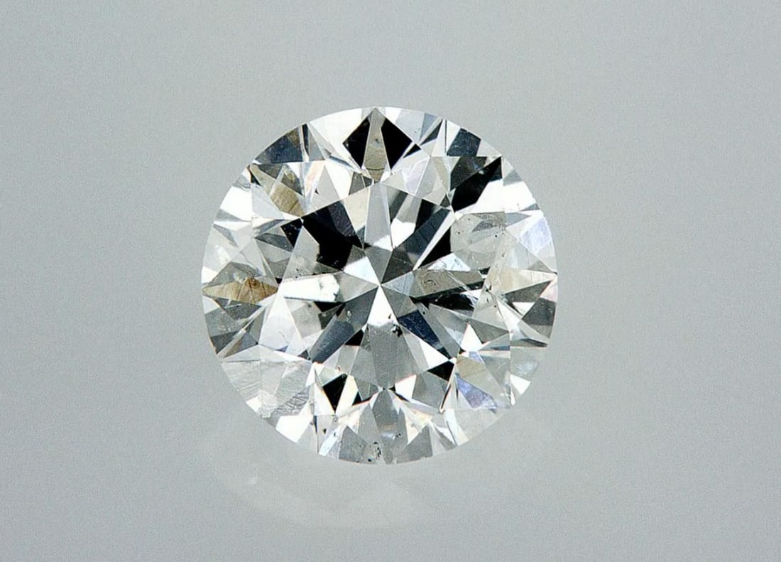 Lab Grown 1 ct, Color E/VS2 IGI Graded Diamond: Lab/Natural Diamond: Lab Carat Weight: 1 Color Grade: E Clarity Grade: VS2 Model: ROUND Fluorescence: None Polish: Excellent Symmetry: Excellent Depth: 61.6 Table: 61.6 Cut Grade: IDEAL Size: 6.38-6.4