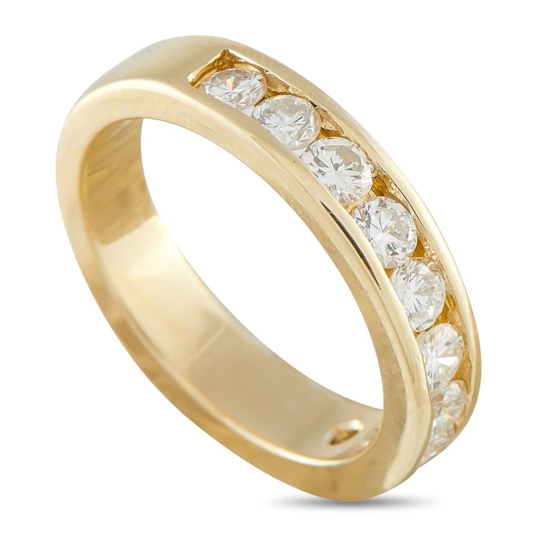 14K YELLOW GOLD 0.75CT DIAMOND HALF-ETERNITY BAND RING: Easy to wear on its own or layered with other bands, this piece offers a sense of permanence that feels relevant day after day. The ring is crafted in 14K yellow gold and features a channel of round