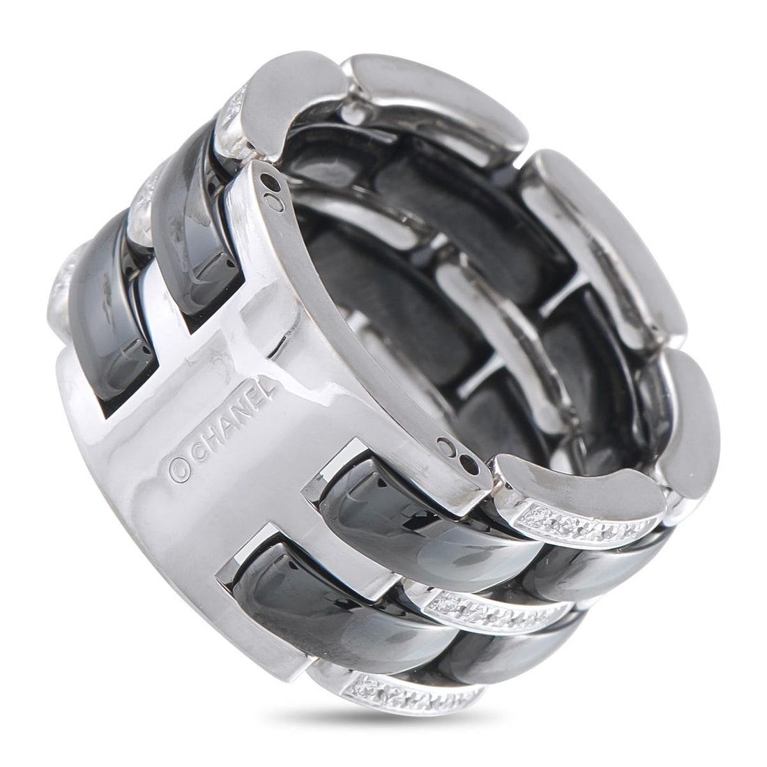 CHANEL ULTRA 18K WHITE GOLD 0.38CT DIAMOND AND BLACK CERAMIC RING: A graphic, high-contrast design makes this Chanel ULTRA ring a dynamic addition to any ensemble. Black ceramic links and 18K White Gold links combine to create the bold, breathtaking design. Diamond a