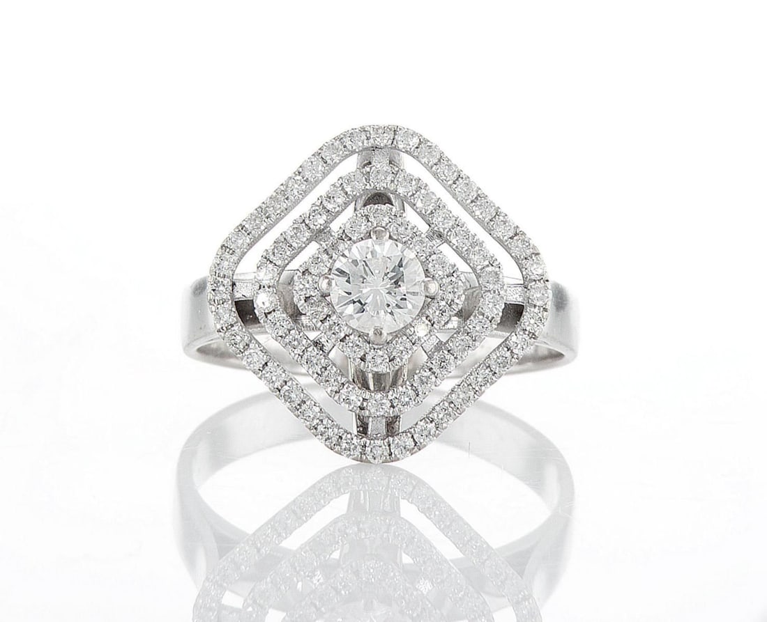 14kt White Gold 1.25ctw Diamond Ring: Jewelry Description Description: One 14k white gold ring, set with natural diamonds. Jewelry Weight: 6.56 Grs Total Diamonds Weight: 1.25 Cts Precious Metal: 14kt White Gold Certificate Number: DSL- 4