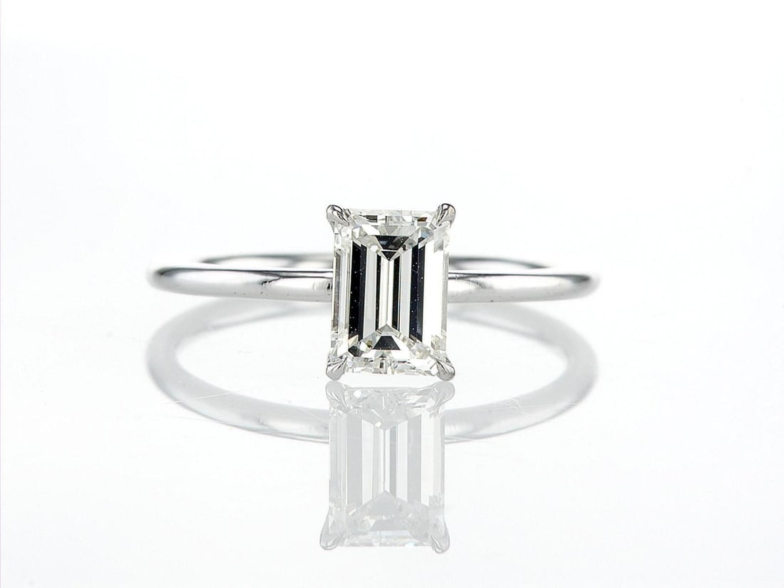 14kt White Gold 1ctw Diamond Ring: One 14k white gold ring, set with one center natural diamond. Jewelry Weight: 1.89Grs Total Diamonds Weight: 1Cts Main Stones Description: Quantity: 1 Cut and shape: Baguette Carats Weight: 1 Clarity: