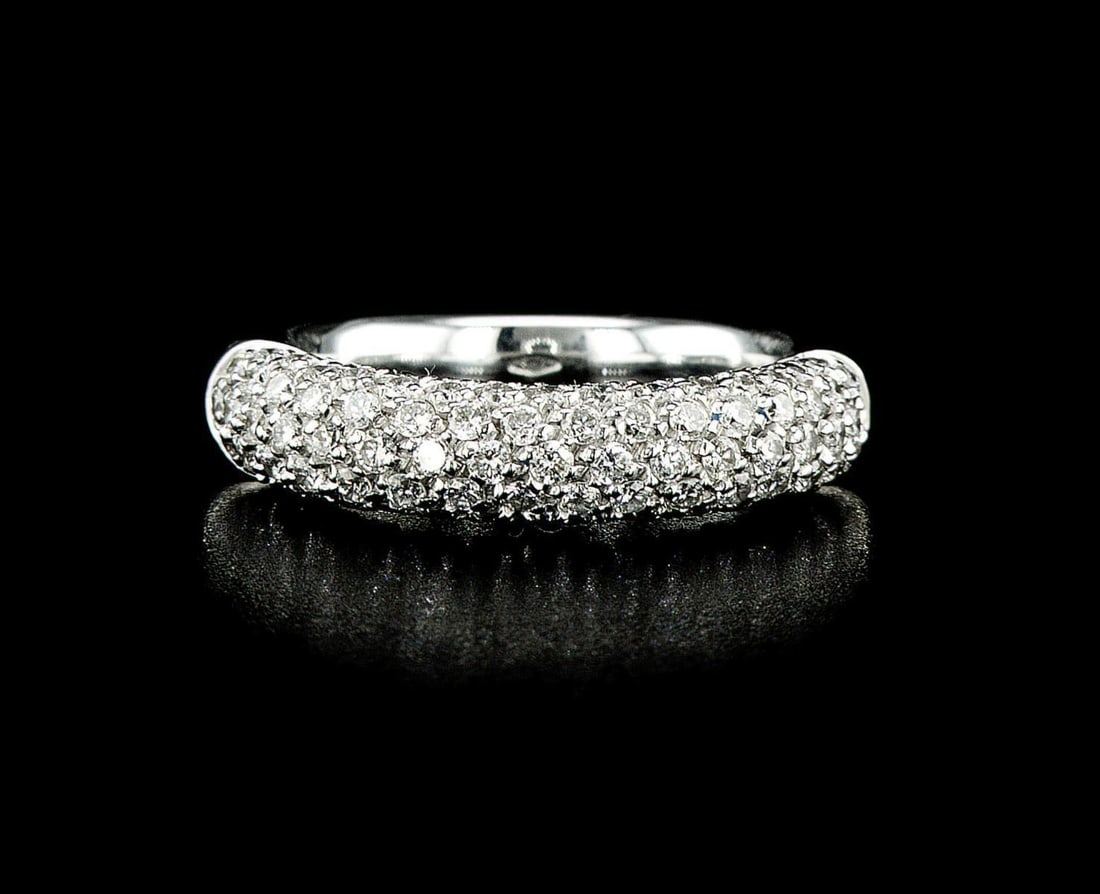 18kt White Gold 1ctw Diamond Ring: One 18k white gold ring (750 stamped), set with natural diamonds. Jewelry Weight: 6.37Grs Total Diamonds Weight: 1Cts Main Stones Description: Cut and shape: Round Brilliant Carats Weight: 1 Clarity: 