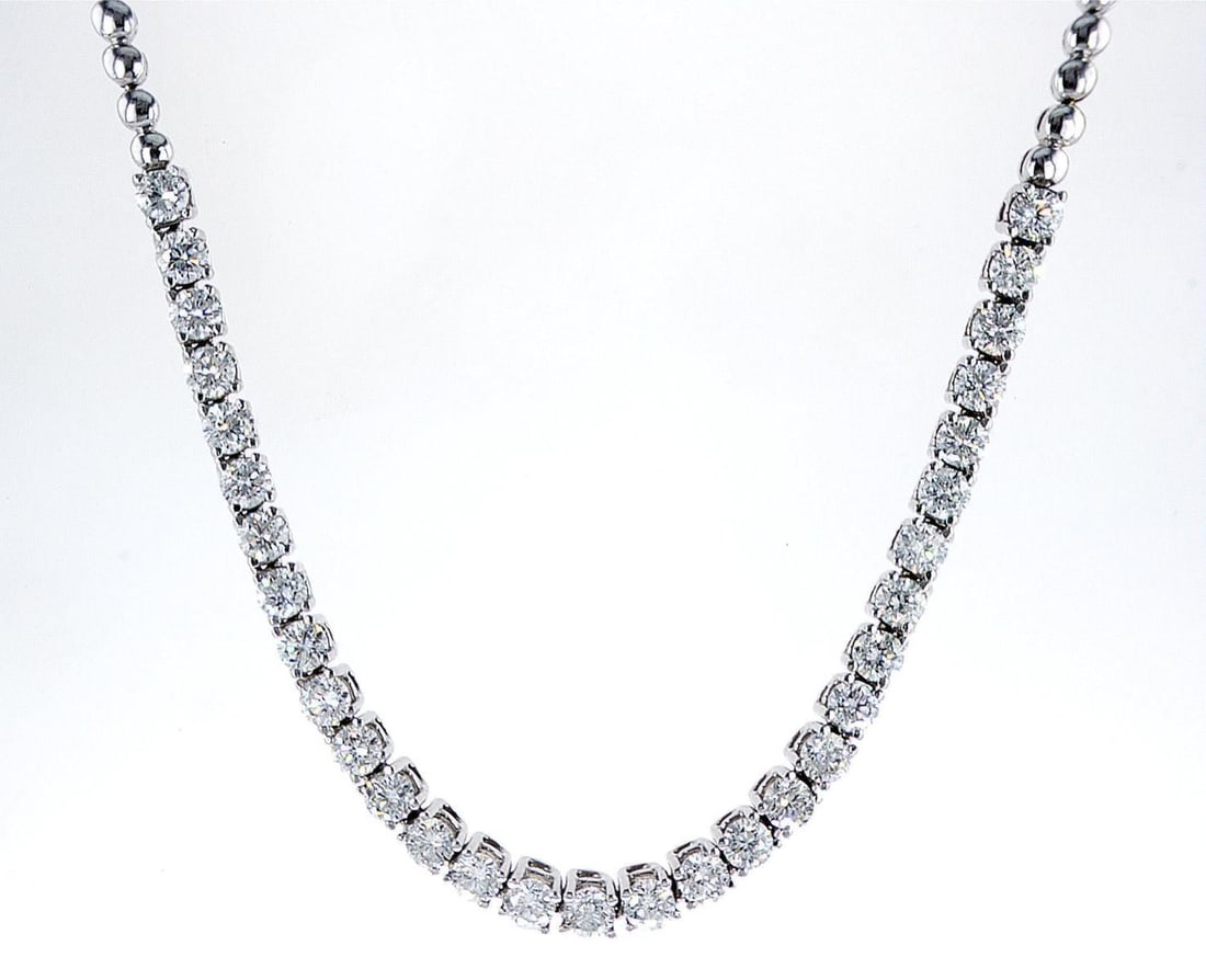 14kt White Gold 4.95ctw Diamond Necklace: One 14k white gold necklace (14k stamped), set with 31 natural diamonds. Jewelry Weight: 25.73Grs Total Diamonds Weight: 4.95Cts Main Stones Description: Quantity: 31 Cut and shape: Round Brilliant Ca